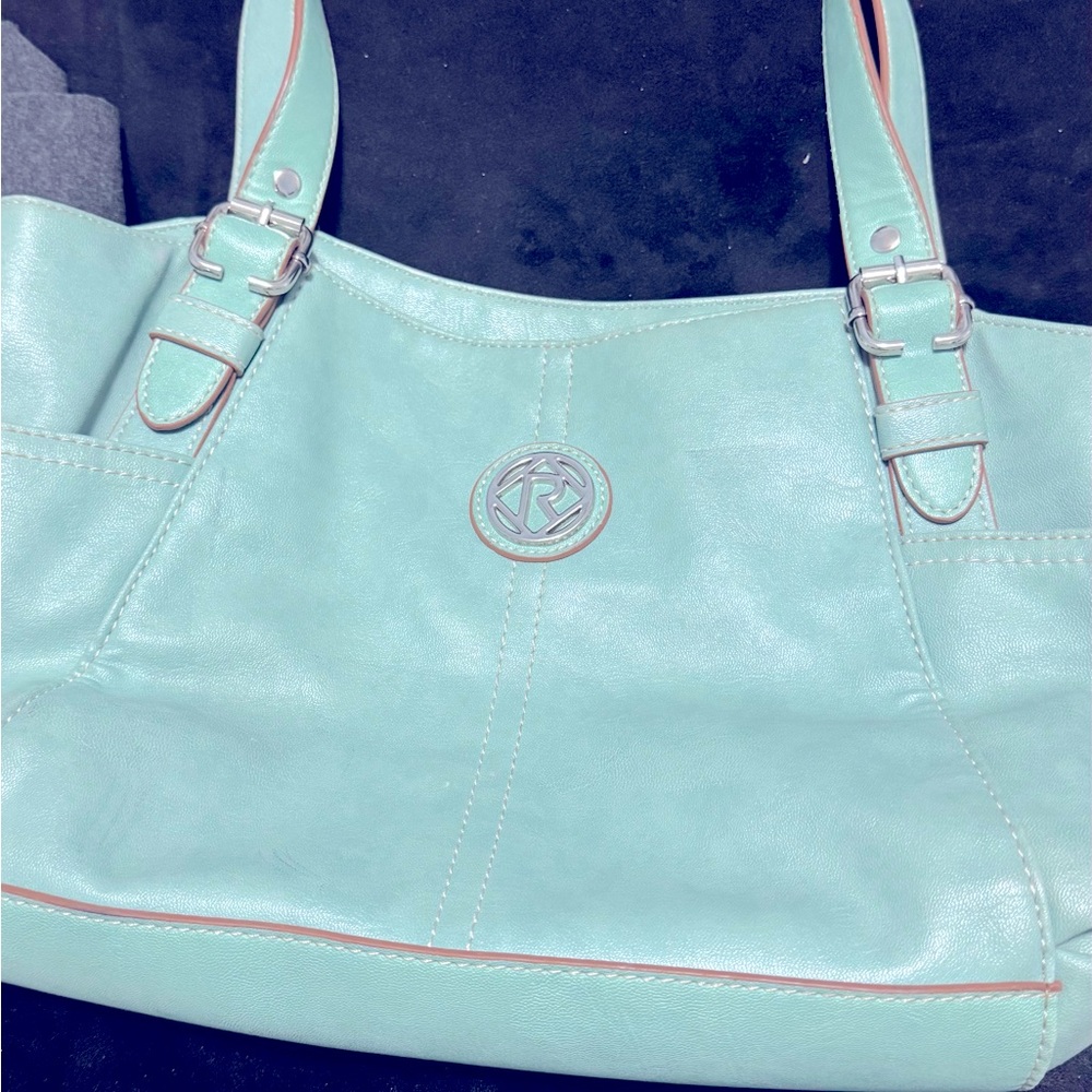 Relic purse with lots of class, style, compartments and pockets.